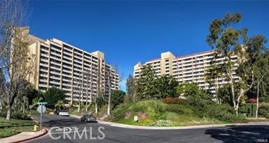 Exceptional view condo in the Towers A Unit. Studio unit on the eighth floor with gorgeous views of the golf course and the Laguna Woods neighborhood. Walk-in closet ceiling fan in the dining room. A two-burner cooktop is featured in the remodeled kitchen with a refrigerator. The bathroom has a cut-down shower for easier access. Laguna Woods is a senior community, and the Towers' monthly assessment includes housekeeping every other week, A dining credit per month for breakfast, lunch, or dinner. Electricity is included, as well as water, trash, and basic cable. There are many activities in the Towers and activities in the community include: bocce ball, tennis, pickleball, horse stables and riding, a 27-hole golf course, a per 3 executive walking course, cever clubhouses, five with pools. There is a state-of-the-art Theatre with shows to entertain. Access is provided by a bus service that goes around the community as well as to local destinations outside the community. Many activities to challenge the mind and body. Close to Laguna Beach. Come and enjoy this beautiful community.