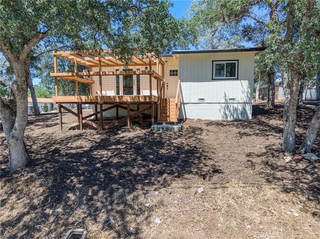 Welcome to 15688 37th Ave, a completely remodeled 2-bedroom, 1-bathroom home in Clearlake. This charming 800-square-foot property, situated on a large lot, offers excellent value for buyers seeking move-in-ready living.
The heart of this home features a beautiful waterfall island kitchen with abundant cabinetry and brand-new appliances. You'll love the stylish vinyl plank flooring throughout and the natural light that streams through the double-pane windows. The new water heater ensures reliable comfort throughout the year.
Step outside to your impressive new front deck complete with a pergola – perfect for morning coffee or evening relaxation. The spacious lot offers ample space for outdoor activities, gardening, or future expansion. A convenient carport protects your vehicle while offering additional storage space.
This home's location places you near essential amenities. Foods Etc grocery store is just a short drive away for your shopping needs. Families will appreciate the proximity to Clear Lake School and Clear Lake Education Centers. For recreation, Redbud Park offers nearby green space and outdoor activities.
The property represents an excellent opportunity in today's market. The combination of recent updates, generous outdoor space, and practical features, such as the carport, makes this an attractive option for first-time buyers or those seeking a comfortable retreat. The large lot size provides privacy and potential for customization.
This newly listed home won't last long in the current market. The thoughtful renovations and desirable features create immediate value, while the location offers both convenience and tranquility in the Clearlake community.