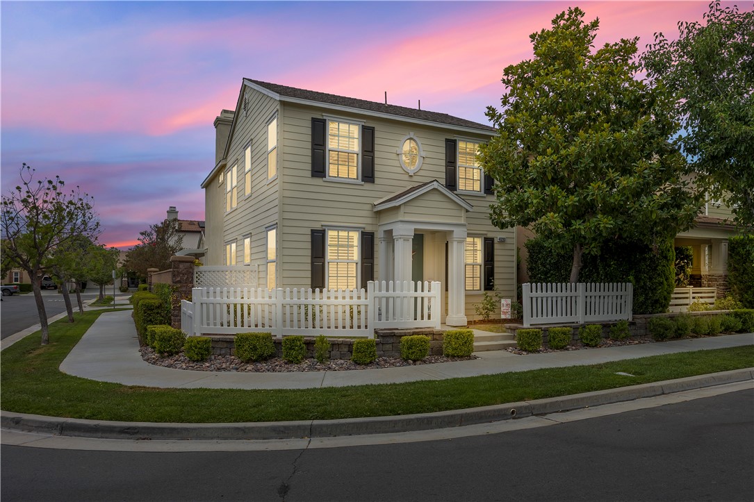 Welcome to this beautifully maintained two-story home, perfectly positioned on a desirable corner lot in the sought-after Harveston community—just steps from the lake! Freshly painted on the exterior, this 4-bedroom, 2.5-bath residence also includes a versatile downstairs office that can serve as a 5th bedroom, offering both flexibility and curb appeal. Step inside to find luxury vinyl plank flooring and plantation shutters throughout, creating a warm and inviting ambiance. The spacious, upgraded kitchen features quartz countertops, ample cabinetry, a center island with pendant lighting, a farmhouse sink, and a walk-in pantry—ideal for everyday living and entertaining. The kitchen opens seamlessly to the cozy family room with ceiling fan and fireplace, while a separate formal living room and dining room provide additional space for gatherings. A convenient half bath completes the first floor.
Upstairs, the primary suite is a peaceful retreat with an upgraded bath boasting dual sinks, an extended shower, and a generous walk-in closet. Two additional bedrooms and a full bath round out the second level. The laundry area is thoughtfully located off the garage for easy access.
Additional upgrades include a QuietCool whole house fan for energy savings. Outside, enjoy a private side patio with alumawood cover—perfect for outdoor dining or relaxing. An attached two-car garage completes this well-cared-for home. Harveston is one of Temecula's most desirable communities, favored by so many for the amenities, olympic sized community pool and splash pad, sports parks, easy commuting, shopping, Ysabel Barnett Elementary and Chaparral High School, and of course the LAKE activities! Close to wine country, Promenade Mall, Old Town Temecula, and the 15 Freeway, come and see why Harveston is at the top of the list for buyers looking for communities to live in Temecula!