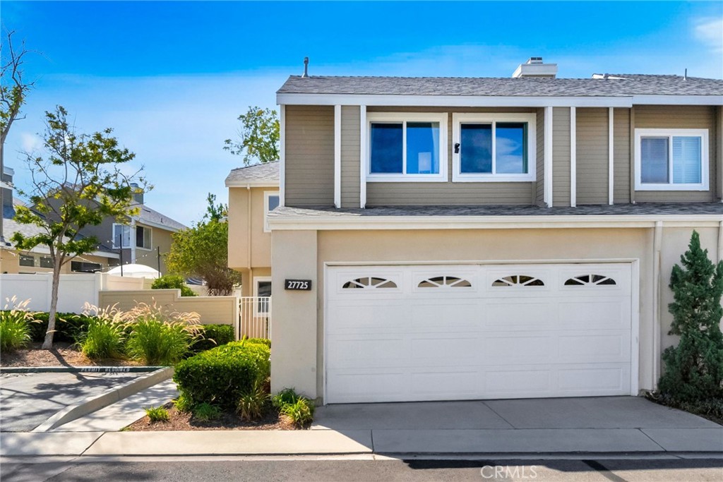 Welcome to 27725 Falkirk, this stunning 3 bed 2.5 bath townhouse features a yard bigger than some single family homes that connects to a peaceful greenbelt, a brand new roof, all new windows, and upgrades throughout the home. Entering the home you have an open and functional floor plan, with vaulted ceilings in the living room, and tons of natural light. Upstairs you have a spacious primary bedroom, with a beautifully remodeled and modern bathroom, a walk-in closet, and 2 more bedrooms sharing an upgraded bathroom. Another key feature to not miss in this home, is the spacious 2 car garage with custom built-ins providing a dedicated space to neatly store everything. As part of the HOA, residents enjoy exclusive access to a pool, spa, and additionally everything Lake Mission Viejo has to offer. This home is move-in ready and a must see!