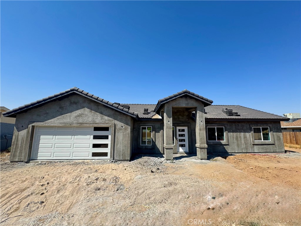 Welcome to this NEW CONSTRUCTION HOME built in 2025. This Residence is located in the city of Hesperia, off Main St and 2nd Avenue. It is close to Grocery Stores, Parks, Libraries, and Schools. This Property Features an Open, Spacious Kitchen equipped with soft-close cabinets, a new dishwasher, a Stove, and Refrigertor. Equipped with quartz marble countertops and a Backsplash, as well as its own Dining room. Quartz countertops are also included in the bathrooms. Two Master bedrooms One featuring walk-in shower. This Residence also has an open, spacious Living room with a Beautiful Rocked Fire Place ! Waterproof Laminate Flooring is equipped throughout the whole house. 3 Full Bathrooms, 4 Bedrooms, Featuring two master bedrooms, the home itself is 1,715 square feet, and the Lot size is 14,200 square feet. To top it off, you get fully paid off Solar Panels with this property. Please keep in Mind this home is still in the process of being built it is a New Construction Home.