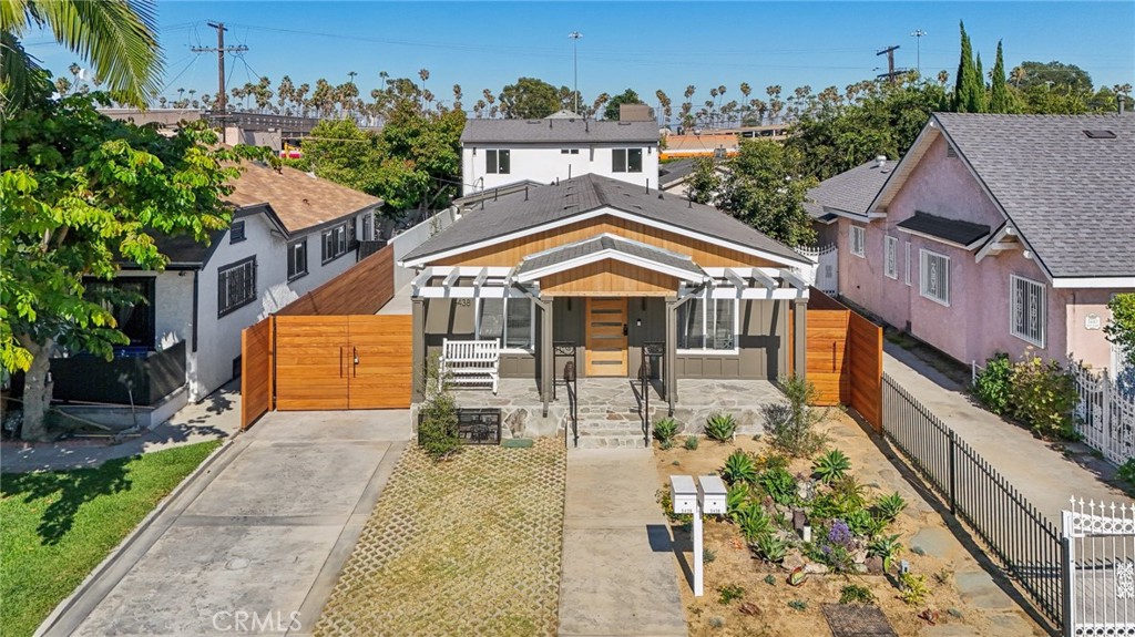 Fully Remodeled SFR + Permitted 2-Story ADU in the Heart of Los Angeles – Income-Generating Opportunity!
An incredible opportunity to own a fully renovated single-family residence with a permitted two-story ADU, located in the vibrant heart of Los Angeles. This multifamily property is perfect for multi-generational living or an ideal setup for income generation—live in one unit and rent out the other, or add both to your investment portfolio. Both the main house and ADU come with final permits and Certificates of Occupancy, ensuring peace of mind and immediate usability.
Main House Features: Fully remodeled with new roof, energy-efficient windows, and smooth finish stucco. All new electrical wiring with new subpanel and J-box/breaker ready for EV supercharger. Dedicated breaker line prepped for solar panel installation. Independent electrical meter: gas line serves main house only. All new plumbing, including repiped gas, domestic water line, and 4-inch sewer line with multiple clean-outs. Independent drainage clean-outs for kitchen and bathroom. Central A/C system. Gas tankless water heater. New electric appliances included: stove and refrigerator
ADU (Accessory Dwelling Unit):
Fully permitted, two-story ADU with Certificate of Occupancy. All-electric unit with no gas meter. Pre-wired for two EV superchargers (2 J-boxes installed). Central A/C system. Pre-wired for security cameras. Multiple exterior outlets, including those ideal for holiday lighting. Separate sewer and water connections with independent clean-outs.
Additional Highlights:
Brand new gate with electrical wiring ready for optional motorized opener. Beautiful courtyard with multiple fruit trees
Whether you're a homeowner looking for supplemental income or an investor seeking a high-performing rental property, this home offers unmatched value, functionality, and long-term potential in a prime Los Angeles location.
Schedule your private showing today!