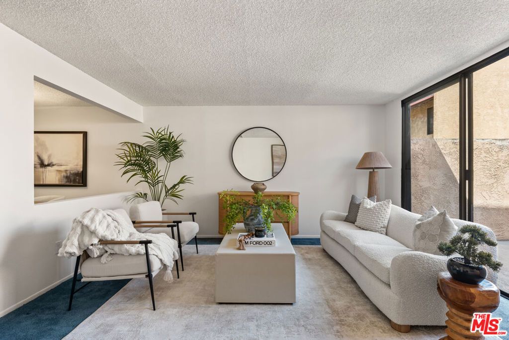 Photo of 22038 Vanowen Street #217, Woodland Hills, CA 91303 (MLS # 25562917)