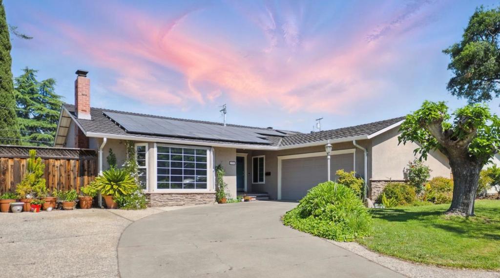 Welcome to your perfect blend of comfort and convenience. This beautifully designed 3-bedroom, 2.5-bath Cambrian home offers 1,695 sq. ft. of light-filled living space on a generous 6,890 sq. ft. lot. The open-concept layout is bathed in natural light from oversized windows and a stunning kitchen skylight, creating a bright and inviting atmosphere. Enjoy the warmth of two fireplacesone in the living room and one in the family roomideal for cozy evenings in. The kitchen features a breakfast bar, gas cooktop, and easy flow for entertaining, while the spacious master suite offers a trace ceiling and direct access to the backyard for morning coffee or quiet relaxation. Step outside to your private oasis with a sparkling pool, lush lawn, and ample patio space for gatherings year-round. Additional highlights include solar panels for energy efficiency, a two-car garage, dedicated laundry area, and beautiful hardwood flooring throughout. Conveniently located within walking distance to Reed Elementary and Paul Moore Park, and just minutes from shops, restaurants, and major tech campuses, this home perfectly combines lifestyle, location, and livability.