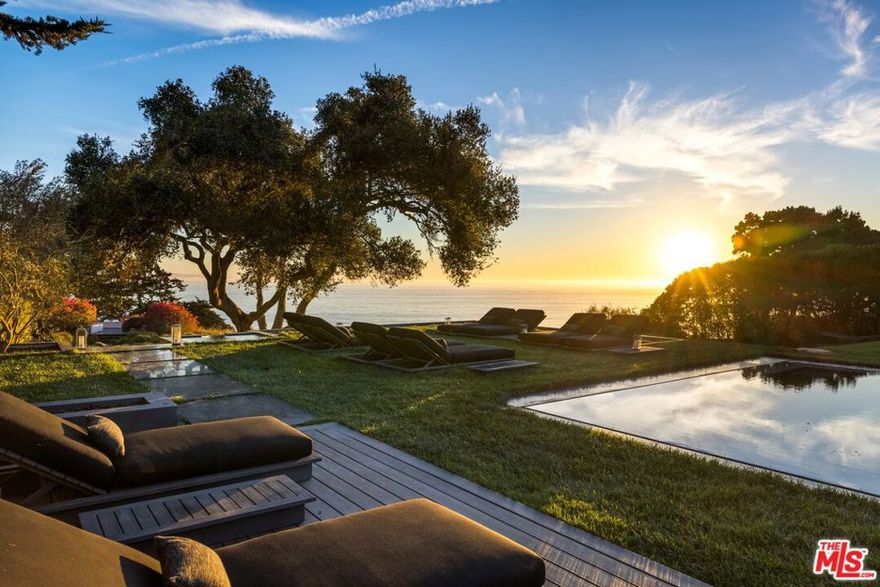 Experience an unparalleled convergence of serenity, privacy, and dramatic design in this one-of-a-kind bluff front coastal sanctuary. Originally designed by notable architect Wallace Neff and landscape designer Thomas Church, the architecturally significant compound boasts spectacular sweeping views of the Pacific Ocean and Channel Islands, sophisticated amenities, and beautifully landscaped grounds  all on 1.5+ gated acres within the highly desirable Hope Ranch enclave.Emphasizing harmony between interior and exterior spaces, the capacious main residence is accentuated by enormous glass walls, windows, and sliding doors  flooding the home with natural light and enhancing appreciation of the immaculate ocean views and the home's serene setting. Impressive volume and vaulted beam ceilings in the main living areas create a sense of playfulness and unlimited possibility, while more intimate spaces with cozy fireplaces and custom-designed cabinetry invite moments of reflection and relaxation. At nearly every turn, residents and guests are invited to engage with the dazzling views and enjoy comfortable spaces from which to experience them, including multiple dining areas, an ocean view terrace with a fire pit, a sparkling pool, and an observation deck.The home's generous floor plan features 6 bedrooms, 7.5 bathrooms, a chef's kitchen, a wine room, multiple elevators, a theater, and a wellness center with a spa, sauna, & steam room. The stunning, modern kitchen boasts high-end appliances, a private dining area, and a temperature-controlled wine room. An additional wine cellar provides ample space for even the most prolific wine enthusiast. The expansive primary suite commands use of the home's left wing, offering luxurious private lounges and dual ensuite bathrooms, while the left wing's lower level is host to the wellness center and the theater/media room. On the other wing of the home are 3 additional en suite bedrooms, ensuring plenty of space for family or guests. On the lower level of this wing is an additional bedroom and staff quarters, storage, and laundry facilities.Outside, a sprawling lawn unfurls toward the seemingly endless horizon, bordered by lush hedges and a majestic oak tree. The ocean-view pool offers a refreshing way to relax or enjoy the sunshine, while a secluded terrace provides the perfect space to unwind at the end of the day. At the property's edge and tucked into the hillside is a detached 1 bed/1 bath guest house with a full kitchen, providing ample privacy and luxurious accommodations for guests.With its stunning and unique design, world-class amenities, and unmatched ocean-front location in Hope Ranch, this incredible property is your chance to create a true legacy on a rare offering on some of California's most sought-after coastline. Community residents can enjoy private beach access, bridle & equestrian trails, dedicated security patrol, community tennis courts, and convenient proximity to the La Cumbre Country Club & Golf Course.
