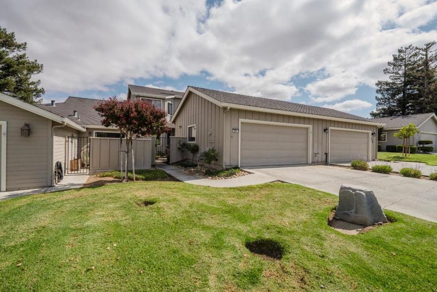 Golf Course Living in Hollister! This beautifully maintained 1,898 sq ft home offers an ideal layout with two private primary bedrooms, each with its own full bathroom perfect for guests, multi-generational living, or added privacy. Step inside to a bright kitchen featuring a gas range, microwave, self-cleaning oven, and refrigerator, all conveniently located near the formal dining room for easy entertaining. The inviting living area boasts a cozy fireplace and skylight, filling the home with warmth and natural light. Enjoy outdoor living at its best with a backyard courtyard that opens directly to the 16th fairway, offering stunning views and a serene setting. Additional highlights include a gated security community, two-car garage with extra storage, laundry room with sink and 220V hookup, central heat, AC, and ceiling fans for year-round comfort, and location in the Southside Elementary School District. This home perfectly blends functionality, comfort, and a golf course location a must-see for those seeking a relaxed Hollister lifestyle!