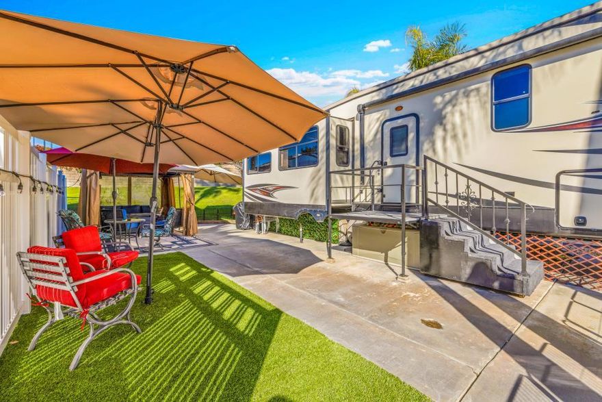 Here's an appealing opportunity. This super nice package includes a 2017 Heartland Elkridge bunkhouse, an exceptionally versatile unit perfectly configured to function either as comfortable guest accommodations or as a dedicated, private office space, offering considerable flexibility to suit various needs.The accompanying lot has been meticulously enhanced, featuring the installation of premium artificial turf for year-round aesthetic appeal and minimal maintenance. Additionally, a new gazebo has been incorporated, establishing a charming focal point within the outdoor area. These thoughtful upgrades collectively create an exceptionally inviting and highly functional exterior environment, ideal for both personal enjoyment and entertaining.Adding to the property's allure is the generously sized greenbelt situated immediately behind the lot. This natural expanse not only provides a picturesque and serene backdrop but also offers an enhanced sense of privacy and openness. This combination of an upgraded outdoor living space and direct access to a natural greenbelt makes this location particularly well-suited and accommodating for pet owners.