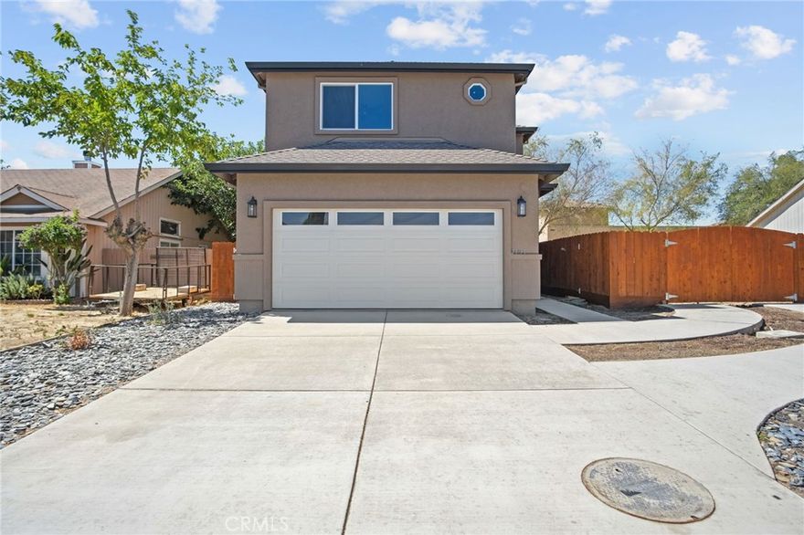 Huge Price Improvement! Seller Motivated! Seller Offering Credit Toward Closing Costs or Rate Buy-Down! Stunning brand-new construction in a quiet Los Banos neighborhood! This two-story home offers approximately 2,100 square feet of thoughtfully designed living space with four spacious bedrooms and two and a half bathrooms. The open-concept layout is perfect for modern living and entertaining. The gourmet kitchen features granite countertops, an upgraded Bosch dishwasher, built-in microwave, Frigidaire five-burner gas range, and a large twelve-foot by four-foot center island ideal for meal prep and gatherings. Enjoy energy savings with fully owned solar panels. The garage is equipped with a 220V outlet for EV charging. Sitting on a 6,459 square foot lot, this property includes a rare, gated thirty-two-foot by seventy-foot RV and boat parking area perfect for trailers, toys, or additional vehicles. The backyard is a blank canvas, ready for your personal design, while the front yard offers attractive, low-water, low-maintenance landscaping. Conveniently located near shopping, schools, and parks. Move-in ready and built for both comfort and lifestyle!