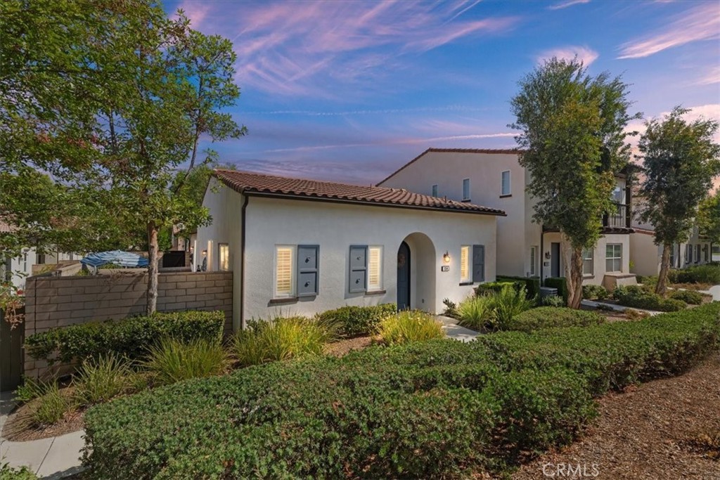 One of the Best Locations in Shady Grove!
Welcome to this exceptional home in Shady Grove, a premier 55+ gated community offering privacy, tranquility, and a true resort-style lifestyle. Perfectly situated on one of the best lots in the neighborhood, this end-unit home has no one above you and boasts a spacious private yard—a rare find.
With 2 bedrooms, 2 baths, and 1,187 sq/ft of living space, this residence was built in 2011 and designed for both comfort and style. The spacious living and dining areas feature beautiful LVT floors, modern baseboards, stone fireplace with a custom mantle, setting ledge and Restoration Hardware light fixtures. The kitchen is a chef’s delight with granite counters, glass-stone backsplash, stainless steel appliances, a Kohler sink, crème-glaze cabinetry, water filtration system, new refrigerator, and LED lighting.
The gorgeous primary suite showcases a vintage brick accent wall, walk-in closet with built-in organizers, and a spa-like bath with step in shower. The second bedroom also has a walk-in closet and a reclaimed wood accent wall. Additional highlights include plantation shutters, an inside laundry room, and a two-car attached garage with direct home access, garage cabinets, work bench and perimeter block walls for added privacy. The home is also equipped with rain gutters and a monitored fire sprinkler system throughout.
Just a short stroll to the clubhouse, pool, and nearby Dos Lagos shopping, dining, theaters, and summer concerts—you’ll enjoy the best of convenience and community.
Resort-style living at its finest—come make this special home yours!