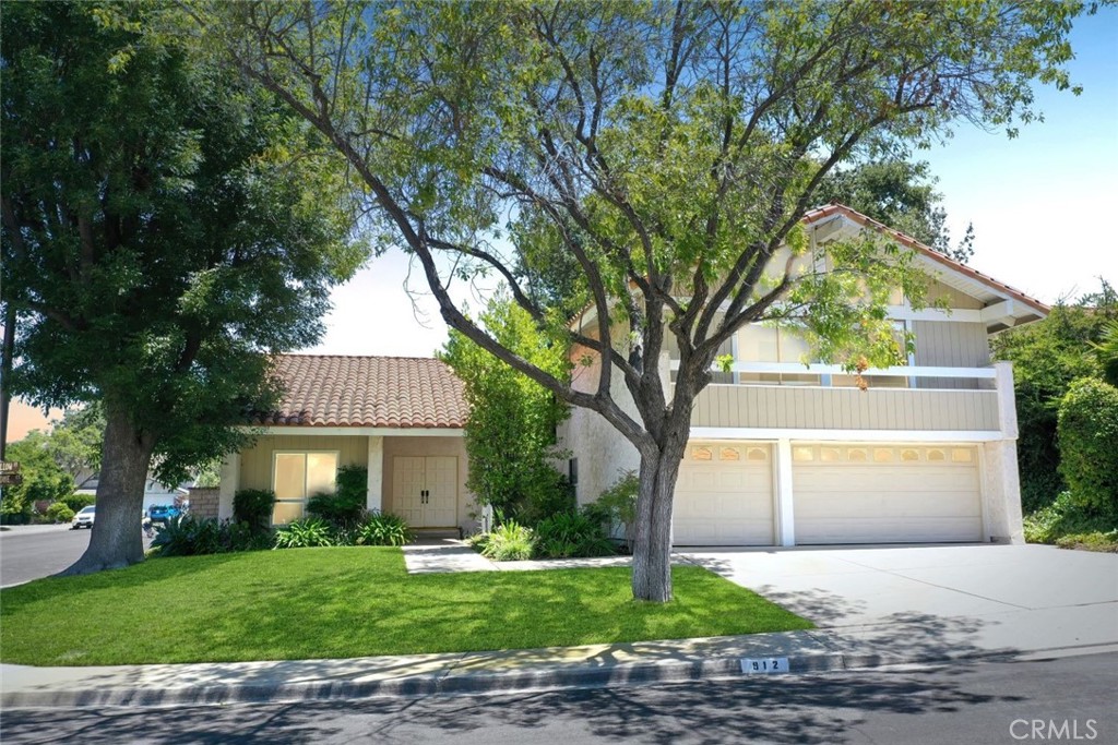 This beautiful Village Home corner house is on a cul-de-sac street, spacious house features 4 bedrooms, 3 baths, 2846 sq. ft. of living space, a beautiful living room with fireplace, a formal dining area, and a family room adjacent to the kitchen with granite counters and updated appliances. Downstairs is one bedroom and one bath. Upstairs is a large primary bedroom with walk-in closet space attached to a bath with a soaking tub in a separate shower area. There are two more bedrooms and another full bath upstairs. This home also has indoor laundry, a three-car garage, central air, and a community pool and spa. Conveniently located near shopping, dining, award-winning schools, beautiful parks, hiking, and biking trails. Recently remodeled with new Kitchen Granite counters, New Floors, and new doors. New dual pane windows and sliding door, new bathroom, recessed lighting & new paint.