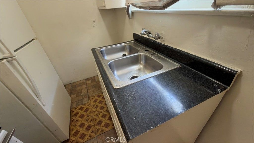 Photo of 1352 W 60th Pl, Los Angeles, CA 90044 (MLS # SR26072670)