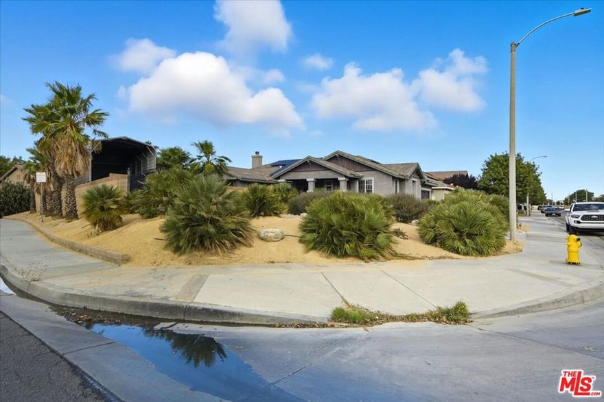 This beautifully maintained corner-lot home sits on a spacious 13,147-sq-ft lot! Please take a moment to view the video link . Home offers both comfort and functionality. Step inside to a bright and open floor plan featuring 3 bedrooms and 2 full baths, a welcoming living room with a cozy fireplace, and large windows that fill the home with natural light. The updated kitchen offers plenty of counter space, ample cabinetry, and a breakfast area perfect for casual dining.  The primary suite includes a private bath and generous closet space, while the additional bedrooms are ideal for family, guests, or a home office. Enjoy year-round comfort with central heating and air, tile and laminate flooring throughout, and an attached 2-car garage with direct access. Outdoors, you'll find a covered patio area perfect for gatherings, along with a covered RV access a rare find that offers space for your motorhome, boat, or extra vehicles. The large fenced yard provides endless potential for entertaining, gardening, or future expansion. Located in a quiet, established neighborhood close to schools, shopping, and parks, this home truly combines convenience, privacy, and pride of ownership.