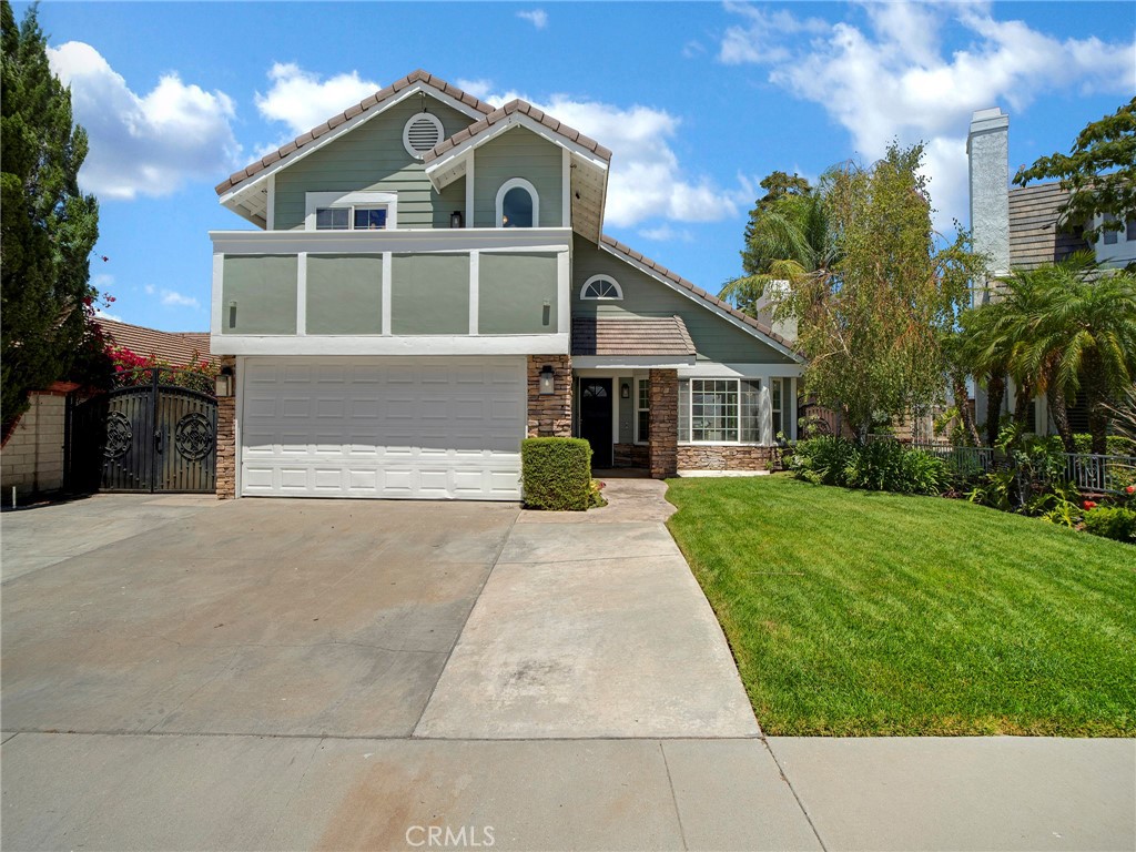 WELCOME TO THIS BEAUTIFULLY MAINTAINED 4-BEDROOM, 2.5-BATHROOM AMERICAN BEAUTY HIGHLANDS CLASSIC, OFFERING BREATHTAKING VIEWS OF SANTA CLARITA. WITH EXCEPTIONAL CURB APPEAL, THE FRONT YARD IS ACCENTED WITH LUSH SOD AND VIBRANT FLOWERS. STEP INSIDE TO DISCOVER ELEGANT, UPGRADED VINYL FLOORING FROM THE CORONADO COLLECTION THROUGHOUT THE MAIN LEVEL. THE BRIGHT AND OPEN LIVING ROOM FEATURES VAULTED CEILINGS, A CHARMING FIREPLACE**, AND A LARGE PICTURE WINDOW THAT FILLS THE SPACE WITH NATURAL LIGHT. THE ADJACENT DINING AREA INCLUDES A SLIDING GLASS DOOR THAT LEADS TO THE BACKYARD—PERFECT FOR INDOOR-OUTDOOR LIVING. THE GALLEY-STYLE KITCHEN OFFERS EXPANSIVE VIEWS FROM THE SINK AND IS EQUIPPED WITH A GAS STOVE, DISHWASHER, MICROWAVE, AND SPACE FOR A COZY BREAKFAST NOOK. JUST OFF THE KITCHEN, THE FAMILY ROOM/DEN ALSO OPENS TO THE BACKYARD AND PROVIDES DIRECT ACCESS TO THE TWO-CAR GARAGE, WHICH INCLUDES OVERHEAD AND SIDE STORAGE. LAUNDRY IS LOCATED IN THE GARAGE, WASHER AND DRYER ARE INCLUDED. (ALL APPLIANCES ARE WITHOUT WARRANTIES). UPSTAIRS, YOU’LL FIND ALL FOUR BEDROOMS. THE PRIMARY SUITE FEATURES A FULL BATHROOM WITH A LUXURIOUS JACUZZI TUB, CUSTOM VANITY, AND SPACIOUS WALK-IN CLOSET. THE HALLWAY BATH HAS BEEN UPGRADED WITH CUSTOM TILE, A MODERN VANITY, AND UPDATED FLOORING. TWO BEDROOMS HAVE BRAND-NEW CARPET, AND ONE INCLUDES A SLIDING DOOR LEADING TO A PRIVATE BALCONY. THE BACKYARD IS IDEAL FOR ENTERTAINING WITH A SPACIOUS PATIO AND BUILT-IN GAS BBQ, ALONG WITH AREAS FOR A REFRIGERATOR AND ADDITIONAL BURNERS. THERE'S POTENTIAL TO ADD A COVERED PATIO AND A SECOND-STORY DECK ACCESSIBLE FROM THE PRIMARY BEDROOM, BUYERS TO INVESTIGATE. THERE IS ALSO POTENTIAL RV ACCESS ON THE SIDE OF THE HOME. ADDITIONAL AMENITIES INCLUDE: CENTRAL AIR AND HEATING, AMPLE INTERIOR STORAGE, FENCED SIDE YARD PERFECT FOR PETS, A SIZABLE STORAGE SHED THAT STAYS WITH THE PROPERTY. THIS PROPERTY LOCATED IN A WONDERFUL CUL-DE-SAC NEIGHBORHOOD, PERFECT FOR FAMILIES OR ANYONE LOOKING TO ENJOY THE BEST OF SANTA CLARITA LIVING. DON’T MISS THE CHANCE TO MAKE THIS INCREDIBLE PROPERTY YOURS!
