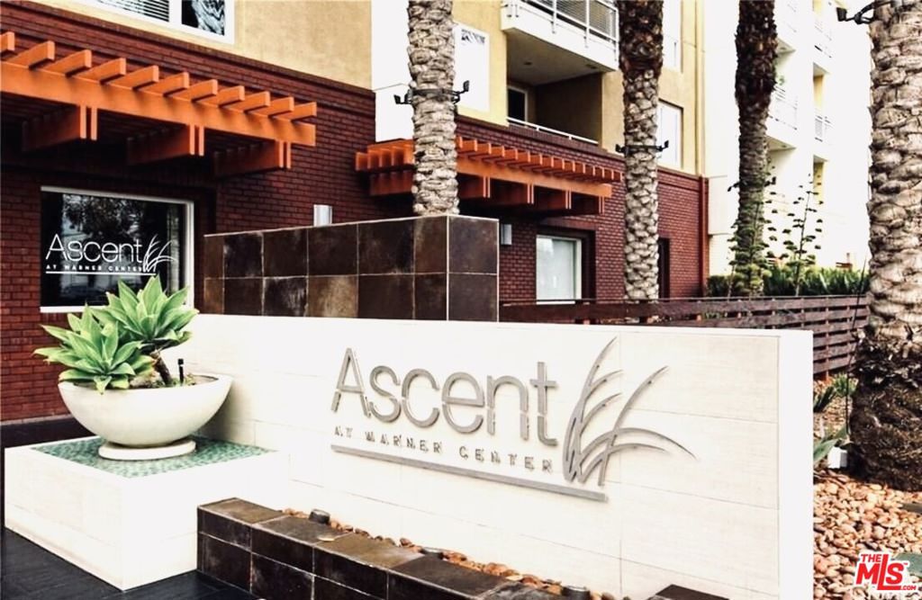 Welcome to this beautiful 2-bedroom, 2-bath condo in the highly sought-after Ascent at Warner Center. Offering 1,050 sq. ft. of comfortable living space, this home combines modern style with everyday convenience.Step inside to find an open-concept layout with a bright living room, sleek kitchen featuring stainless steel appliances, granite countertops, and plenty of cabinet space. The primary suite includes a private bath and generous closet space, while the second bedroom is perfect for guests, a home office, or a roommate setup.Enjoy your morning coffee or evening wind-down on the private balcony with views of the courtyard. Additional features include in-unit laundry and two assigned parking spaces.Ascent at Warner Center offers resort-style amenities, including a sparkling pool and spa, fitness center, outdoor fireplace lounges, BBQ areas, and a clubhouse for gatherings. Located in the heart of Woodland Hills, you're moments away from Westfield Topanga, The Village, fine dining, shopping, and easy freeway access.