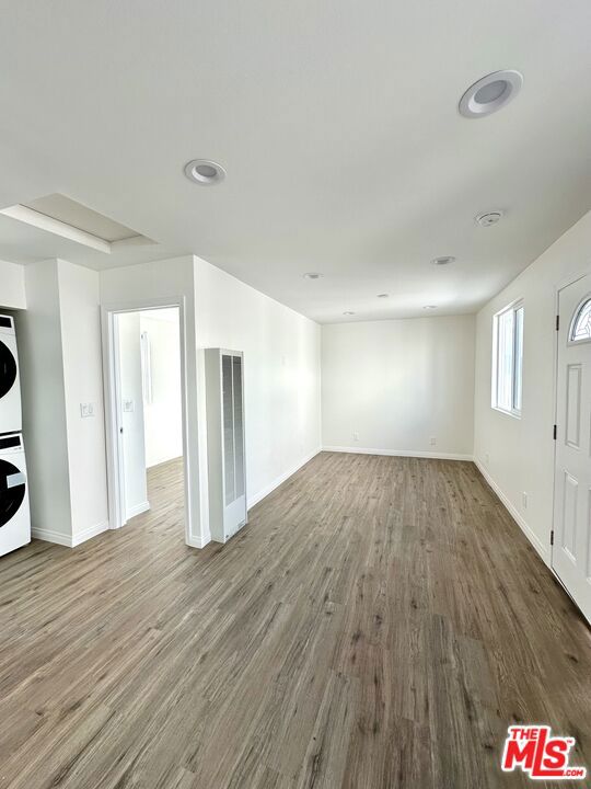 New one-bedroom apartment in a cozy Quadplex ready for move in. This apartment has an array of features to make it your ideal home as this gem was recently constructed ensuring a fresh living space. Comes with a well-appointed kitchen equipped with a refrigerator, gas range, microwave, and dishwasher. Create culinary masterpieces in this sleek and modern space. Save time with in-unit laundry, washer and dryer are provided for the ultimate convenience for your busy lifestyle. Mini-split AC unit in living room will allow you to tailor the climate to your preferences throughout the seasons. The living room provides a comfortable and inviting space, perfect for relaxation or entertaining. Seize the opportunity to make this new residence your home sweet home.