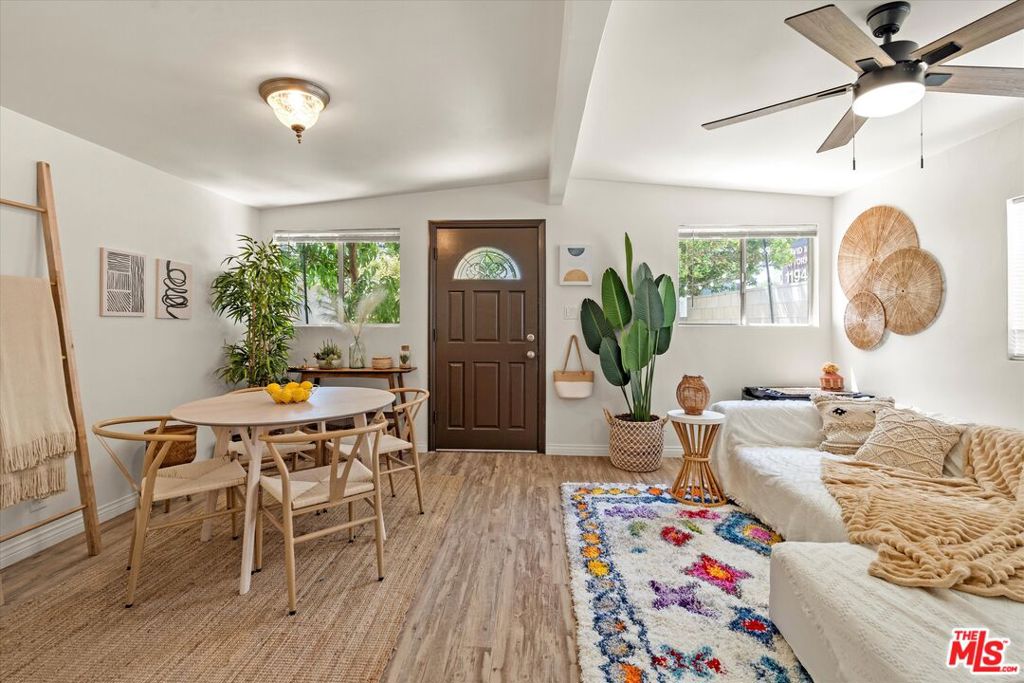 This charming, light-filled home offers a rare opportunity to own west of the 405 without the hassle of HOAs or the headaches of a fixer. Tucked deep behind a private fence, the thoughtfully updated residence is move-in ready and blends original charm with everyday convenience. The bright layout features two well-sized bedrooms and a versatile bonus room ideal for a home office, gym, or creative studio. Outside, a spacious private yard with mature citrus trees provides a peaceful setting for relaxing or entertaining. Zoned R3, the property also holds future potential for savvy investors looking to build three or more units. Enjoy unbeatable walkability to Playa Vista's shops, restaurants, parks, and weekend farmers market, with easy access to Culver City, Venice, Marina del Rey, and Santa Monica. Don't just drive by, step inside and experience how quiet and unique this tucked-away gem truly is.