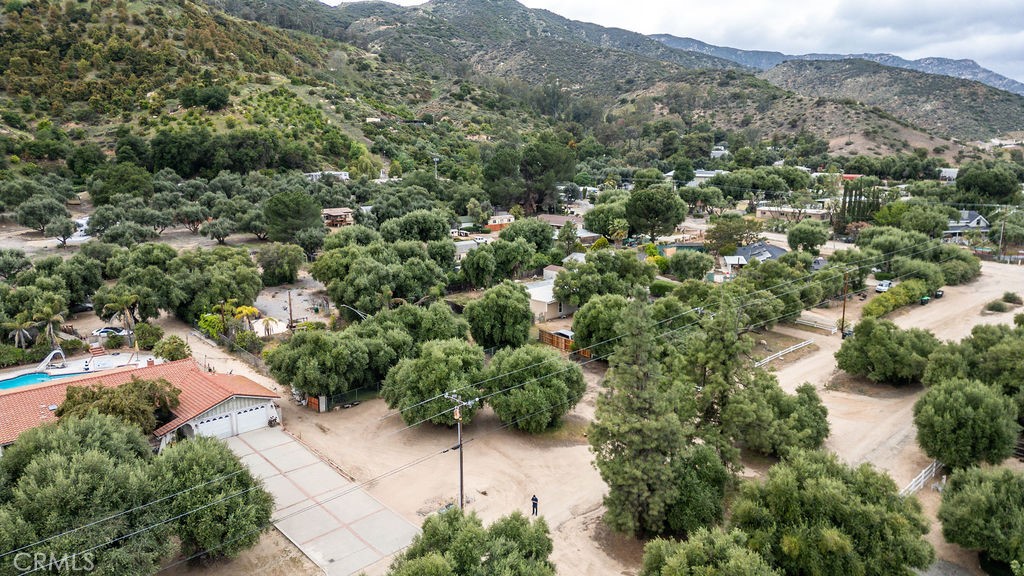 Build Your Dream Home in Lake Elsinore!
This spacious 0.9-acre lot is the perfect canvas for your future home—ideally located just 13 minutes from the lake and 10 minutes from downtown. Set in a quiet residential neighborhood with easy access to major roads, you’ll enjoy the peace of suburban living while staying close to shopping, dining, and entertainment.
Surrounded by elegant villas and custom-built homes—many with swimming pools—this area blends the charm of an established community with the excitement of continued growth. The lot is build-ready with existing utility connections, including gas, electricity, and water, making your construction process smooth and efficient.
The property previously supported a mobile home, confirming its suitability for residential use. A concrete foundation remains, along with a mature garden filled with fruit trees such as oranges, lemons, grapefruits, and olives. Just a block away, cobblestone streets and upscale developments reflect the area's rising value and appeal.
Whether you're dreaming of a cozy cottage or a modern luxury home, this lot provides the space and flexibility to make it happen. Don’t miss this rare opportunity to own land in one of Lake Elsinore’s most desirable and fast-growing neighborhoods—where nature, convenience, and creativity come together.