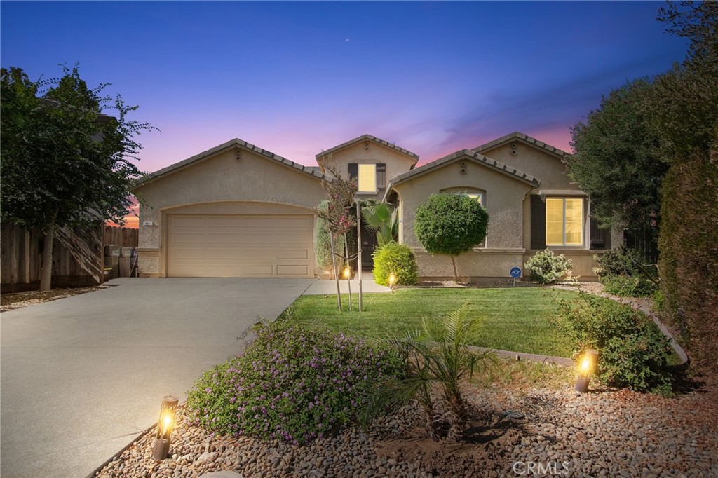 Welcome to this stunning move-in ready single-story home! Boasting 5 spacious bedrooms, 3 full bathrooms, and 2,234 sq. ft. of well-designed living space, this property is perfect for a growing or multi-generational family. The open-concept layout seamlessly connects the living and dining areas to a spacious kitchen featuring abundant counter space, a large center island, generous pantry, and plenty of cabinets—ideal for cooking, storage, and entertaining. The home offers a thoughtfully designed floor plan with an oversized primary suite featuring a walk-in closet, double sinks, a soaking tub, and a separate shower, as well as a secondary suite with its own full bath—perfect for in-laws or guests. Large windows fill the home with natural light, enhancing its warm and inviting feel. Step outside to a beautifully landscaped backyard complete with a covered patio, tranquil water fountain, storage shed, and a greenhouse equipped with a fully automated irrigation system—an entertainer’s and gardener’s dream! Relax in this backyard oasis under the covered patio or enjoy your morning coffee while watching the hummingbirds. Located in a desirable and established neighborhood, this home offers convenient access to schools, parks, shopping, freeway access, and is just a short drive to UC Merced. This one truly has it all—comfort, space, and location!