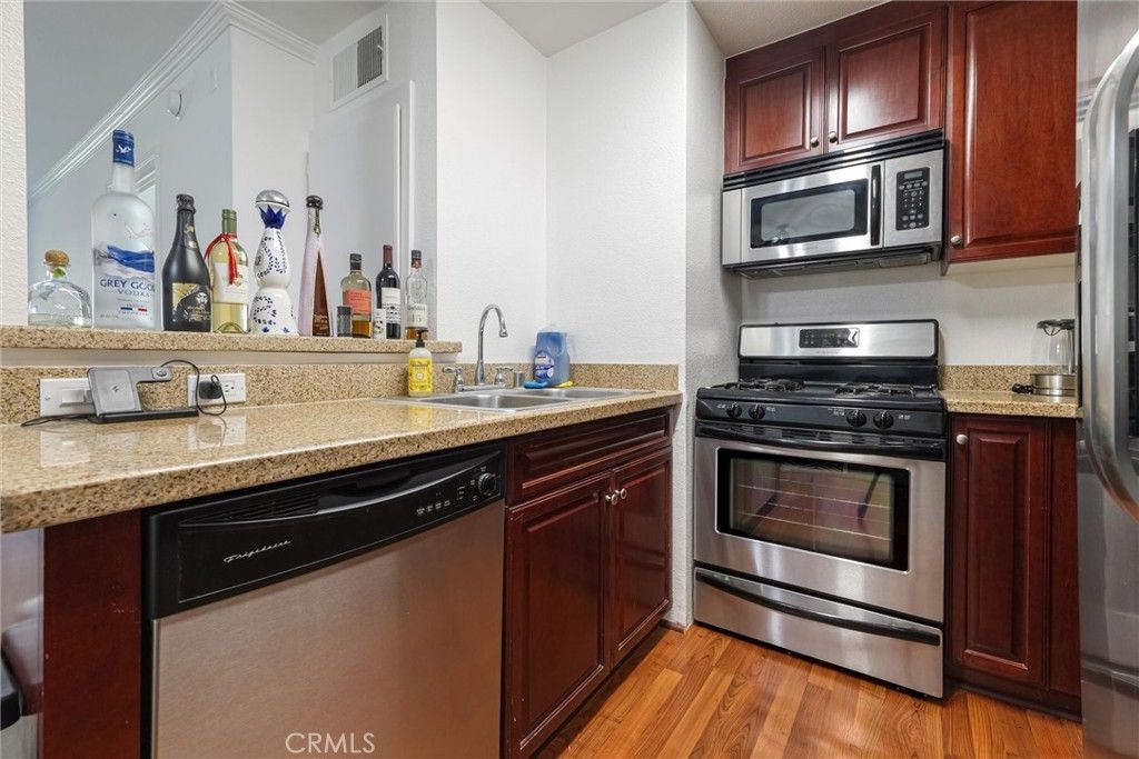 Photo of 21450 Burbank Boulevard #203, Woodland Hills, CA 91367 (MLS # SR25193805)