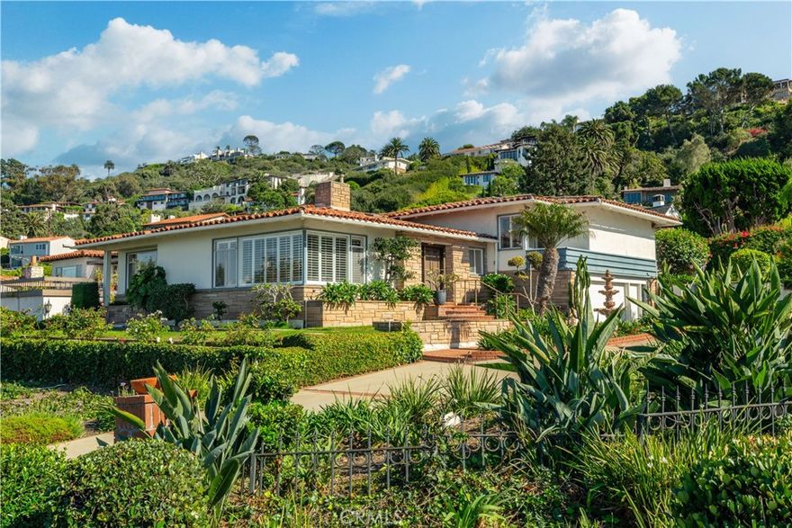 Located on a sprawling 12,000+ square foot corner lot in the heart of Malaga Cove, this spacious home offers a versatile floor plan and timeless appeal. A generous living room, formal dining room, and a separate family room that flows seamlessly from the updated kitchen with granite counters, creating an inviting great room. The adjacent laundry room adds convenience.



Up a short flight of stairs are four large bedrooms, including the expansive primary suite with a walk-in closet and serene ocean and coastline views. Outside, the private pool and spa provide the perfect escape from the everyday. The oversized garage complements the semi-circular driveway, while central air conditioning ensures year-round comfort.