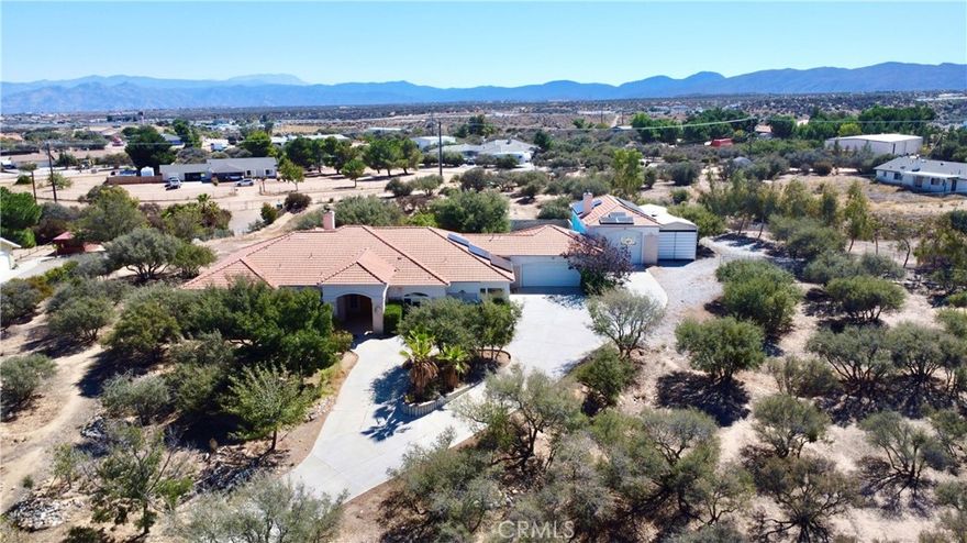 Welcome to this exceptional Oak Hills estate offering the perfect blend of comfort, privacy, and functionality. This stunning 4-bedroom, 4-bathroom home sits proudly in the center of its expansive 104,108 square feet lot, reached by a long private driveway that ensures peace and seclusion.



Step inside to find a spacious, open-concept layout with abundant natural light and a spacious inclosed sun room. The home’s resort-style backyard features a beautiful private pool, complete with a solar heating system for year-round enjoyment.



The property is equipped with a powerful solar energy system that produced approximately 42.8 megawatt-hours (42,800 kWh) in 2024 — a tremendous energy advantage for sustainability and cost savings.



Car enthusiasts and adventurers will love the large attached two-car garage, a massive RV garage, plus an additional covered RV parking area — offering space for all your vehicles and recreational needs.



The grounds include numerous fruit trees, open areas for gardening or expansion, and endless potential to personalize and enhance the outdoor space.



Located in the highly desirable West Oak Hills neighborhood, this home combines the best of modern efficiency, rural tranquility, and everyday luxury — an ideal retreat for those seeking space, privacy, and energy independence.