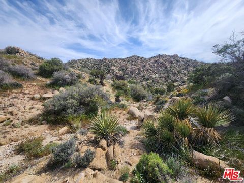Photo of 20 W Omega Trail, Yucca Valley, CA 92286 (MLS # 23291589) Photo of 20 W Omega Trail, Yucca Valley, CA 92286 (MLS # 23291589)