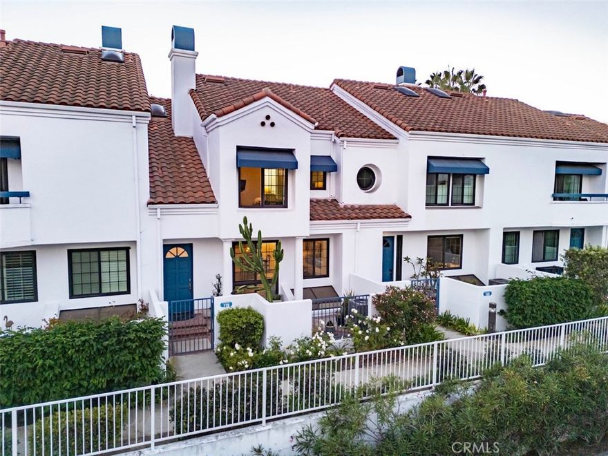 Step into coastal living made easy in this beautifully updated three-bedroom, four-bathroom townhome in Pacific Ranch, one of Huntington Beach’s most sought-after gated communities — where coastal charm meets everyday comfort. Offering the best of beachside living - just over a mile from the sand of Surf City USA - this home is truly move-in ready—every detail has been cared for.

The kitchen, remodeled in 2016, features granite countertops, stainless steel appliances, soft-close cabinetry, and double ovens—perfect for cooking and gathering with friends.

The main level also features two living areas, a gas fireplace, and a retro-chic wet bar, all brought together with stylish hardwood-look plank flooring.

Upstairs, an airy landing with additional storage leads to two en suite bedrooms, each with vaulted ceilings. The primary suite feels like a private retreat with a 2022 remodeled spa-inspired bathroom complete with quartz counters, a soaking tub, a gorgeous walk-in shower, and a walk-in closet.

Downstairs, a versatile third-room “getaway” with an en suite bath is ideal for guests, a play area, gym, Zoom room, or home office. Enjoy two outdoor patios for relaxing or entertaining, plus an attached two-car garage, a spacious indoor laundry room, and a new (2020) energy-efficient central HVAC system for year-round comfort.  Smart-home features include a Ring doorbell and Wi-Fi-controlled thermostat. Within Pacific Ranch, tree-lined paths, three sparkling pools, and friendly neighbors create a true sense of community—complete with holiday decorations and summer strolls. The association maintains the roofs and windows, adding peace of mind to the resort-style amenities. Close to the beach, shopping, schools, and downtown, this home delivers the lifestyle you deserve.  Whether you’re a first-time homeowner or looking for a turnkey beachside retreat or investment, this Pacific Ranch gem delivers comfort, convenience, and the Huntington Beach lifestyle you’ve been dreaming of.