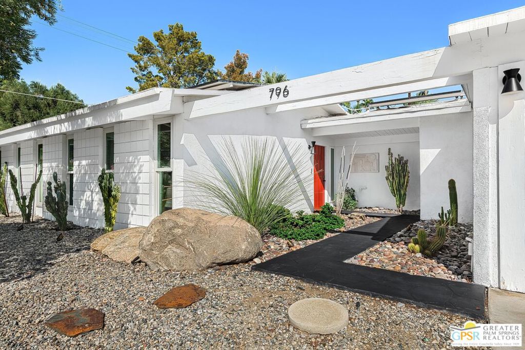 Experience the allure of mid-century modern living. This 4-bedroom, 3-bathroom home offers approximately 2,270 square feet of thoughtfully designed space. Originally crafted by the renowned Alexander Company and designed by the iconic architectural firm Palmer and Krisel, this property features an addition by legendary architect Albert Frey, creating a spacious primary suite that blends seamlessly with the home's classic aesthetic. Enjoy breathtaking views of Mt. San Jacinto from the serene outdoor space, complete with a sparkling pool and an above-ground spa. The latest remodel was meticulously executed to maintain the home's mid-century charm while utilizing modern efficiencies, including triple-pane Andersen windows and a 22-panel solar system for sustainable living. This home is a true blend of architectural history and contemporary comfort, perfect for those seeking style and function in the heart of Palm Springs.