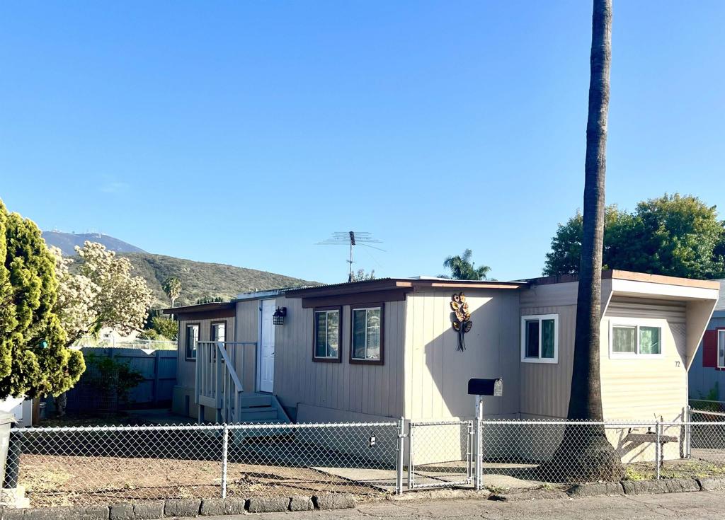 PRICE REDUCTION ALERT!!! Welcome to the Sweetwater Lodge, an all-ages community. This home sits on a corner lot with a beautiful and a well sized private yard, perfect for weekends with the family. It features new paint, a custom kitchen, granite countertops, and nice laminate flooring throughout the unit. In addition, this unit offers 3 bedrooms, a comfortable living room and one bath. A perfect starter home!