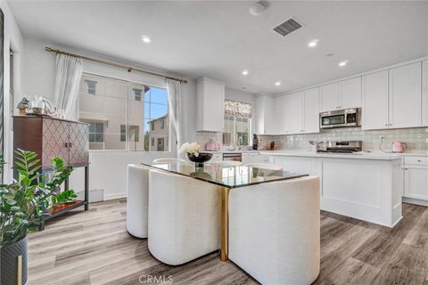 Photo of 747 Spring Garden Gdn, Irvine, CA 92618 (MLS # OC25222542) Photo of 747 Spring Garden Gdn, Irvine, CA 92618 (MLS # OC25222542)