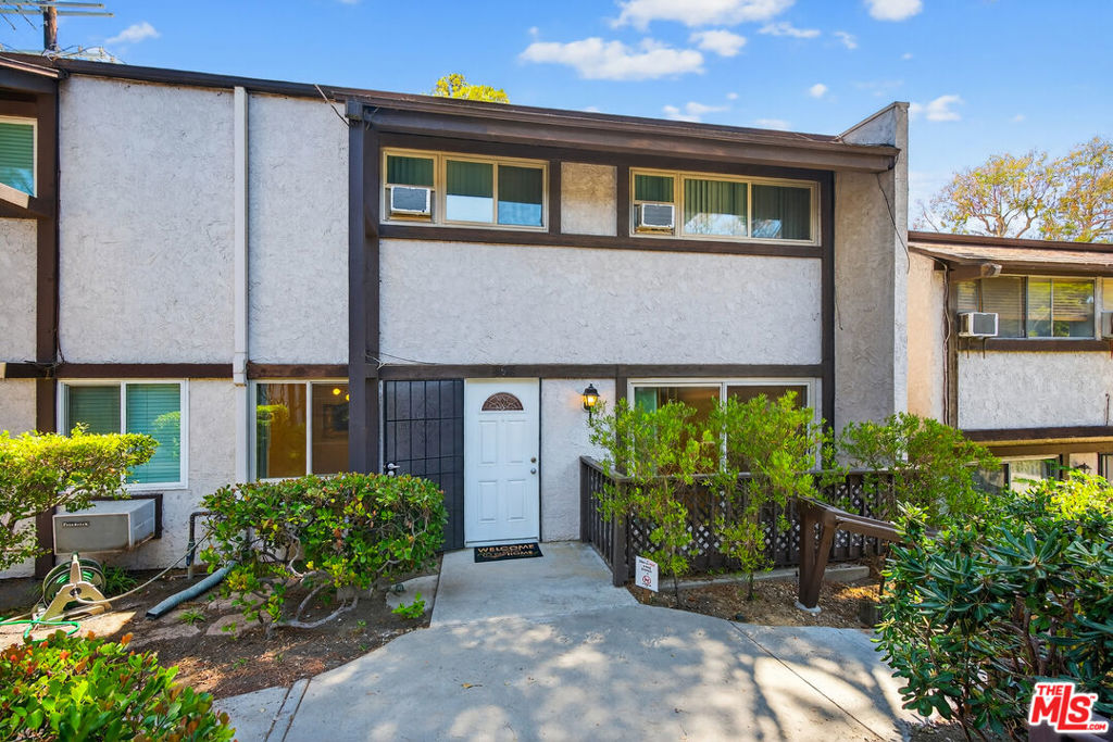 Welcome to Miraleste Canyon Estates! This beautifully remodeled townhouse offers 2 bedrooms, 1 full bathroom, and 2 half bathrooms across 1,107 sq. ft. of comfortable living space.The main level features an open-concept layout with a bright living room, dining area, and kitchen, along with a convenient half bath. Upstairs, you'll find two spacious bedrooms, an updated bathroom, and washer/dryer hookups for added convenience. This unit also includes two assigned parking spaces.Miraleste Canyon Estates is a secure, gated community with 24/7 live guard security and resort-style amenities. Residents enjoy access to 3 sparkling pools (one heated year-round), 2 spas, 2 fitness centers, a clubhouse, multiple laundry rooms, and ample guest parking.The HOA includes water service and permits one pet (up to 25 lbs) per unit. Ideally located near hiking trails, the waterfront and harbor, shopping centers, dining, and with easy freeway access, this home offers the perfect blend of comfort, security, and convenience.