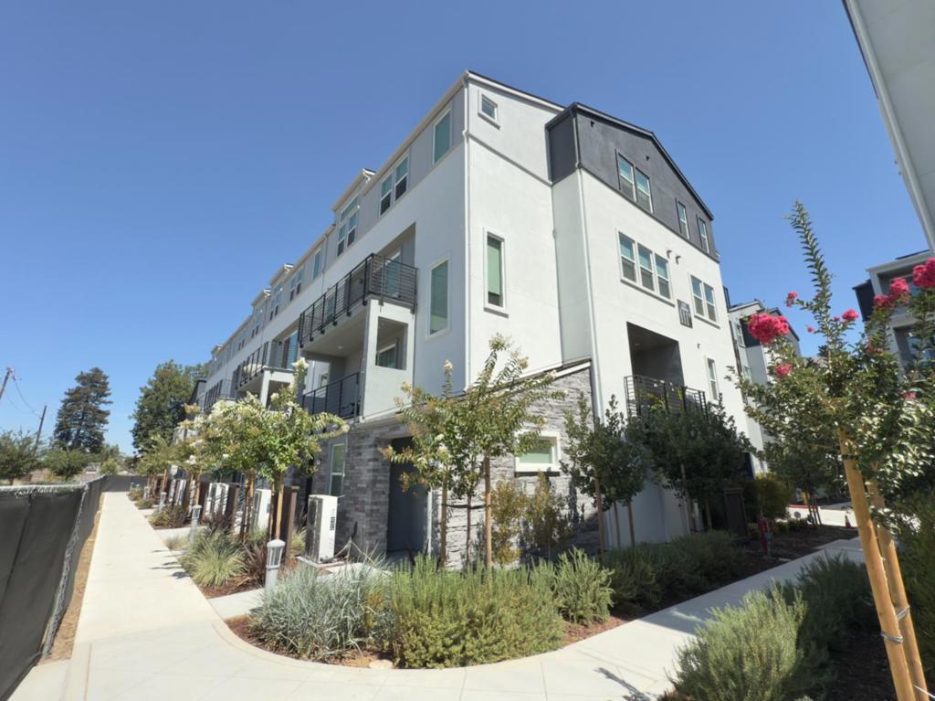 Step into this brand-new townhome, perfectly located just minutes from the vibrant Santana Row and Westfield Valley Fair. Nestled within a thoughtfully designed Pulte community featuring a basketball court, children's playground, dog park, and picnic areas, this home combines modern convenience with a private, upscale neighborhood feel. Inside, entertain guests in the spacious great room or craft gourmet meals in the stylishly updated kitchen, complete with sleek granite countertops and premium stainless steel appliances. Expansive sliding glass doors and soaring ceilings fill the home with natural light, creating an open, airy, and inviting atmosphere. Additional highlights include: Independent temperature control in each room Solar panels for low-to-no electricity bills Brand-new washer, dryer, and kitchen appliances European white oak hardwood flooring ADA-compliant design for accessibility This home truly offers the perfect balance of luxury, comfort, and convenience. Owner pays for HOA Fee and Property Taxes. Renter is responsible for all utilities. First months rent and security deposit due at signing. No smoking allowed. Up to three small pets allowed.