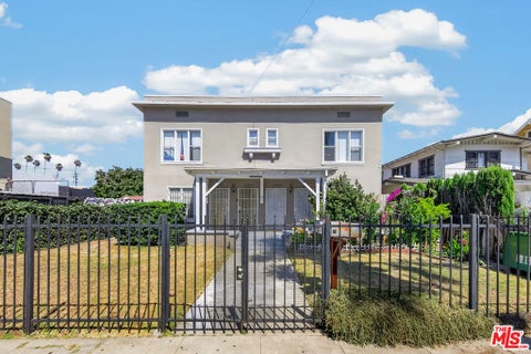 Photo of 1322 4th Avenue, Los Angeles, CA 90019 (MLS # 26868577)
