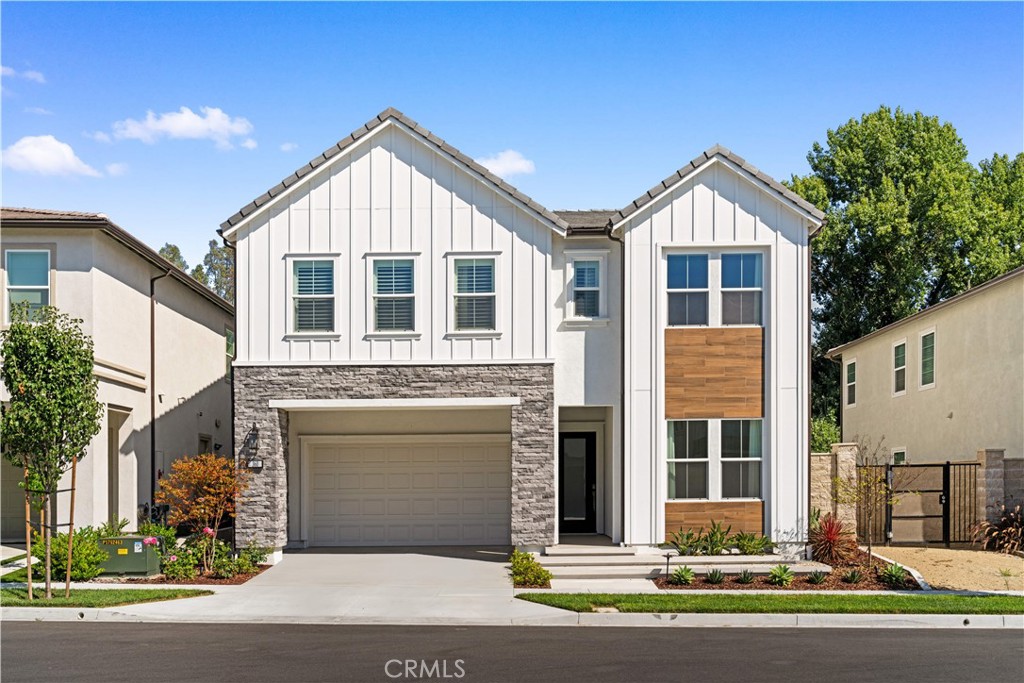 VIEW! VIEW! VIEW! Toll Brothers home boasts an excellent location, adjacent to a community park, swimming pool, spa, BBQ area, and notably, no neighbors in the back! It's the most sought-after 5-bedroom, 5-bath residence in the Magnolias of the Meadows, Lake Forest. The layout includes one bedroom and a full bath downstairs, with the remaining four bedrooms and baths upstairs. The ground floor features upgraded tile flooring, a spacious chef's gourmet kitchen with granite countertops, stainless steel appliances, a 6-burner gas stove, a wall oven/microwave, white wood cabinets extending to the ceiling, a large kitchen island, and ample storage. The home also offers a light-filled formal living room and dining room with recessed lighting. Enjoy the benefit of no Mello-Roos and a low property tax rate of only 1.06%. --- A MUST-SEE, DON'T MISS OUT!