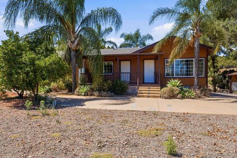 Photo of 9111 Sierra Alta Way Way, El Cajon, CA 92021 (MLS # 260010347SD)
