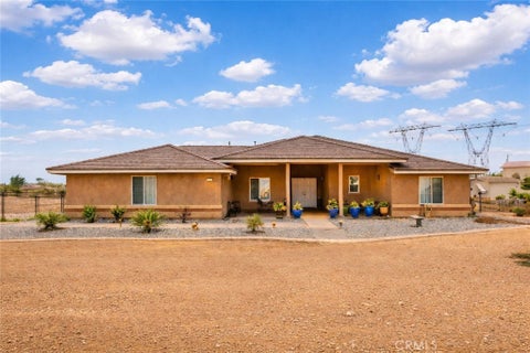 Photo of 6797 Blue Rose Ln, Oak Hills, CA 92344 (MLS # HD26167668)