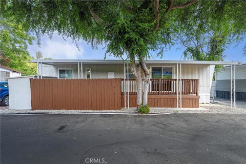 Photo of 10711 Sherman Grove Ave #68, Sunland, CA 91040 (MLS # CV26096195)