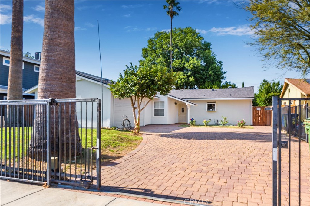 Welcome to this newly renovated single-story home offering 3 bedrooms and 2 bathrooms across nearly 1,400 sq. ft. of thoughtfully designed living space. Set on a generous 7,803 sq. ft. lot, this property perfectly blends modern upgrades with everyday comfort. Inside, you’ll find brand-new flooring, fresh interior paint throughout, and a stylish new kitchen with contemporary finishes. Additional features include an updated roof, a 2-car attached garage, and a gated, spacious driveway for added convenience and privacy. The open floor plan creates a bright, welcoming atmosphere ideal for both relaxing and entertaining. The expansive backyard is a blank canvas—perfect for hosting gatherings, starting a garden, or exploring options to add a pool or ADU (Accessory Dwelling Unit) for extra income or guest accommodations. Conveniently located near shopping, dining, parks, and schools, this move-in ready home is a perfect combination of style, function, and potential.