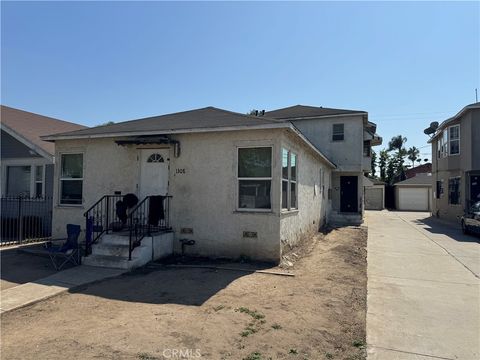 Photo of 1310 W 89th Street, Los Angeles, CA 90044 (MLS # PW26008937)