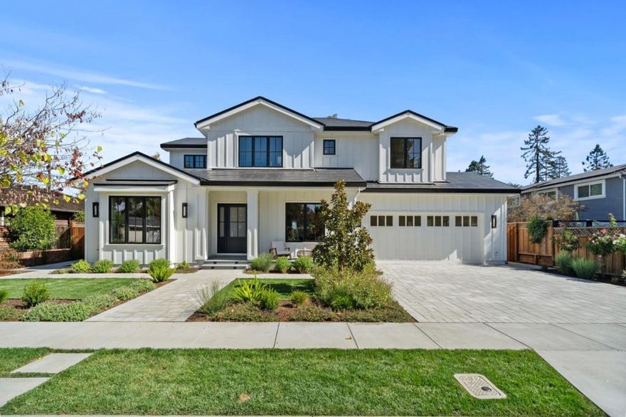 New Construction- Modern Green Farmhouse in the Heart of Willow Glen - 2020 James Place is a new, exquisitely designed modern farmhouse on a 9,875 sq ft lot in one of Willow Glens most coveted neighborhoods. With 5 beds, 4.5 baths, and 4,471 sq ft, it blends timeless style with forward-thinking green design. Wide-plank hardwood floors, vaulted ceilings, and custom millwork define the interiors. The kitchen showcases Taj Mahal quartzite counters, Thermador Pro appliances, dual dishwashers, oversized island, and a hidden walk-in pantry. A great room with a soaring ceiling and gorgeous fireplace opens to the backyard through multiple French doors. Upstairs, the primary suite offers vaulted ceilings, dual walk-in closets, and a spa-like bath with soaking tub and dual vanity. Unique features include a sound-dampened office with private patio, butlers pantry, Tesla Solar Roof, dual-zone HVAC, upstairs laundry with dual washers/dryers, and a 3-car garage with 11 ceiling.  Enjoy three fireplaces, low-VOC finishes and appliances, a paver driveway and back patio, and professionally landscaped/designed front and back yards. Located around the corner from  Booksin Elementary and minutes from downtown Willow Glen. 2020 James Place is more than just a home, come experience it for yourself!
