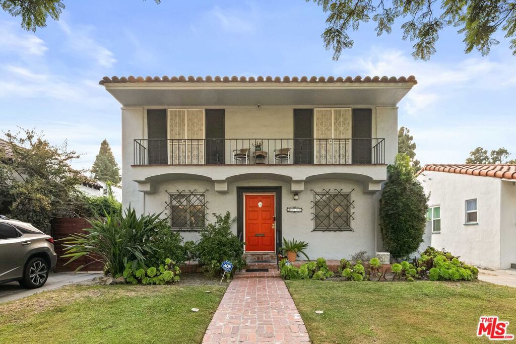 Discover the timeless character of this classic Spanish Revival two-story home, perfectly situated on a tree-lined street in the heart of coveted Leimert Park. Featuring three bedrooms and two bathrooms, this residence is filled with original details from the elegant winding staircase to the rich hardwood floors that speak to its architectural heritage. A light-filled sunroom offers a tranquil retreat, while the galley kitchen and formal dining room provide a welcoming setting for living and entertaining. This home presents a rare opportunity for the next owner to enhance and personalize it, while honoring its historic charm. With wonderful bones, vintage character, and endless potential, this is a chance to bring reimagined ideas to a classic beauty in one of Los Angeles' most treasured neighborhoods.