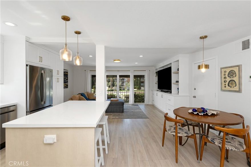 Welcome to beach!  This beautifully remodeled 2-bedroom, 2-bath home in Huntington Beach is fully updated from top to bottom, it features custom cabinetry, luxury-style finishes, and the convenience of inside laundry. If the loads of natural light is not enough, there is are recessed lights and designer light fixtures throughout.  A gorgeous, custom built-in media cabinet provides ample storage and serves as a sophisticated focal point in the living area. With a balcony off the living room to enjoy the ocean breeze, this home also has abundant parking which includes one space in a shared garage, plus 2 additional assigned spaces.



With easy access to the bike trail and just about a mile from the beach, this home offers the perfect blend of a comfort and coastal living. Walk to nearby shopping and dining, including Trader Joe’s and Starbucks, or take a short drive to Target, Whole Foods, and other grocery and retail options. If that's not enough, the trendy Fermentation Farm and Nudae Coffee are right up the hill.  The walking score is 71 and biking score is 85. Easy freeway access makes commuting simple, and highly regarded Huntington Beach schools serve the area.

Enjoy all that Surf City USA has to offer, from its beaches and parks to its relaxed coastal lifestyle just minutes from your door.