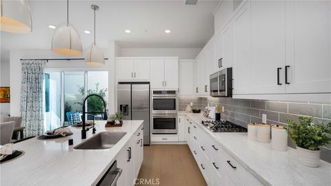 Photo of 138 Yugen, Irvine, CA 92618 (MLS # PW25271397)