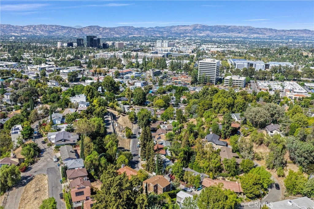 Photo of 5217 Marmol DR, Woodland Hills, CA 91364 (MLS # OC26213311)