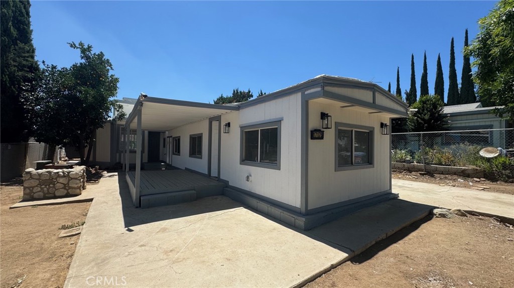 Newly rehabbed 2 bedroom 1 bath, Fresh paint inside and outside, new floors. Buyer owns land, NO HOA.