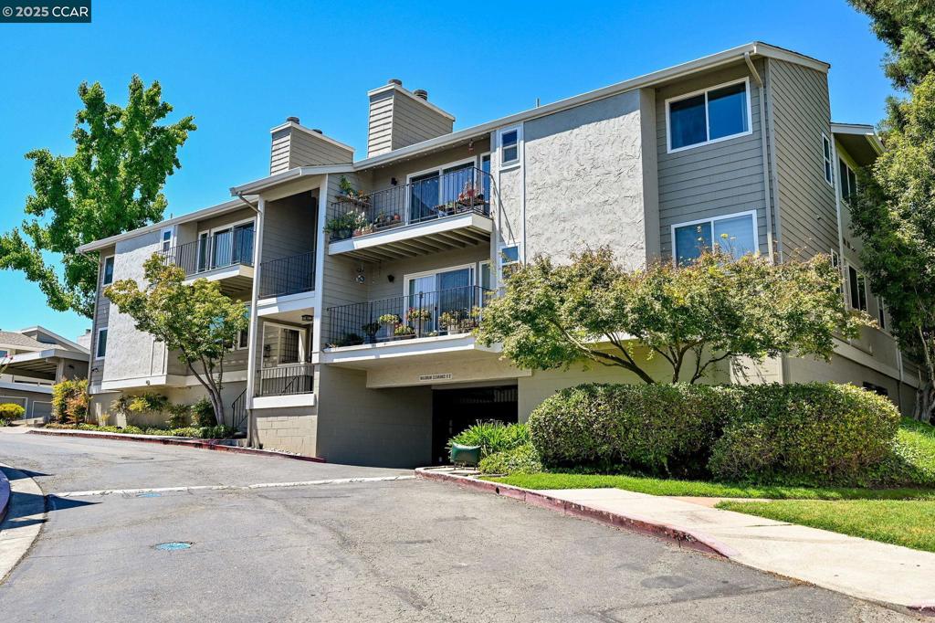 Top-floor condo in Prime Walnut Creek Location! No rental restrictions! This roomy 2 bedroom, 2 bath, condo features dual pane windows, newer kitchen appliances, in unit washer/dryer, and ample storage. The open-concept dining and living area includes a cozy gas fireplace, perfect for relaxing evenings. Step out onto the balcony off living room — an ideal spot to enjoy your morning coffee. This home comes with secured 2 car garage parking and a large walk-in storage unit and 1 unassigned permit parking. Pet friendly with a dog park. Cool off in the complex's pool or simply relax in the spa. Perfect for homeowners and investors alike. Ideally located with easy access to highways 680 & 24, Pleasant Hill BART, as well as local dining and cafes, shopping centers, parks are within minutes! Images are staged virtually.