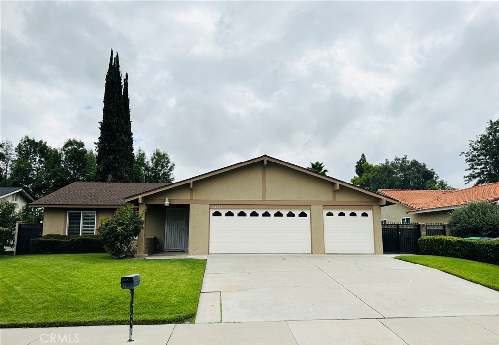 Light and bright updated single-story south of Barton home. Dual-pane windows, plantation shutters, updated interior doors, and recessed lighting throughout. Remodeled kitchen with granite countertops and matching stainless steel Jenn-Air appliances, including refrigerator, six-burner range, microwave, and warming drawer, with stainless steel dish drawers. Kitchen island has built-in storage, and several cabinets feature pull-out drawers and a Lazy Susan. Kitchen is open to the living room with fireplace and an expansive family room with two glass sliders leading to the backyard. Two sets of large bi-fold doors open to reveal a multi-purpose space with backyard access that would be perfect for use as a home office, homework area, craft or sewing nook, etc. Hall bath has an updated vanity with granite countertop and a tiled tub surround with glass doors. Both bedrooms have ceiling fans, and one has a walk-in closet. Master bedroom has double-door entry, ceiling fan, glass slider access to backyard, his-and-hers mirrored closets, and an en-suite bath with updated vanity, granite countertop, and tiled shower with bench and glass doors. Private landscaped backyard with block wall, covered patio, and fruit trees. Three-car direct-access finished garage with storage and laundry hook-ups, freshly painted exterior, weekly gardener included. Close to LLUMC and VA Hospital, Bryn Mawr Elementary School, and just minutes to ESRI. Available October 5, 2025.