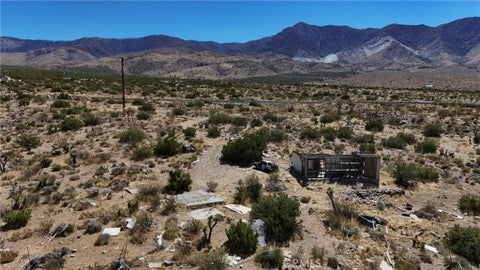 Photo of 744 Powerline Road, Lucerne Valley, CA 92356 (MLS # HD26205573)