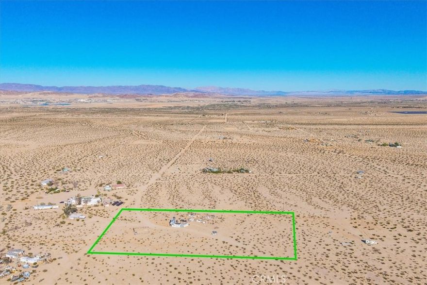 5 acres of 29 Palms land with expansive views! Located just minutes from downtown Twentynine Palms, which is full of unique and trendy shopping, delicious dining, and more, this prime 5-acre parcel of land is also minutes away from the military base and local schools—ready for your ideas! A water meter is in place, and the property is equipped with extra efficiency, including a solar power system, which makes things much easier! As you step onto the property, you are surrounded by stunning, vast open desert landscapes with views that go on for miles! Come take a look today before this one is gone!