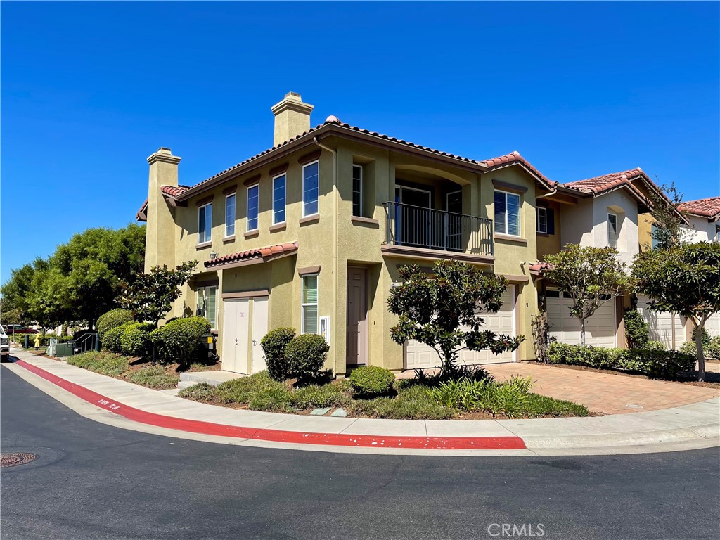 Beautiful townhome in the highly sought after neighborhood of Oak Dr. Villas in Vista. This home has 2 bedrooms (upstairs), 2 baths, 2-car attached garage and a balcony area. The entrance to the home is downstairs with direct access to the garage. The living area, kitchen and bedrooms are all upstairs on the same level. There is upgraded vinyl plank flooring throughout with brand new carpet in the bedrooms. Walk in the front door and head up the stairs to the living room area with cozy fireplace then continue to the spacious kitchen with granite counter tops, stainless steel appliances, island ready for your breakfast bar chairs, and then down the hall to the 2 bedrooms, 2 baths and laundry room. The primary bathroom has a walk-in closet and double vanity sinks. The bedrooms and family room have ceilings fans and the home has fresh touch up paint. This location is convenient being walking distance to Foothill Oak Elementary and close to shopping centers, restaurants, and less than 20 minutes to the local beaches and close to freeways. A must see!